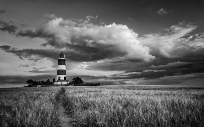 David Powley | Evening light over Happisburgh Lighthouse Mono