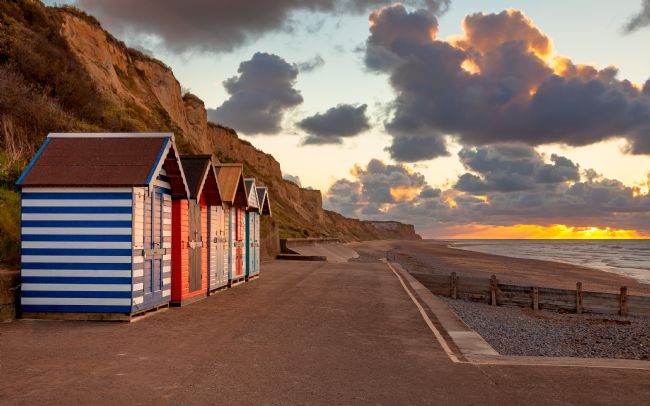David Powley | Cromer beach huts at sunset