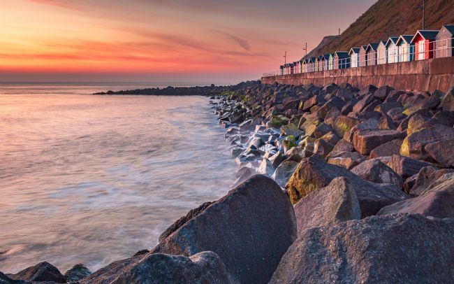 David Powley | Sheringham beach huts at dawn