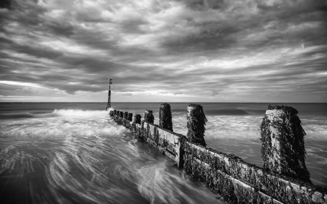 David Powley | Evening light on Cromer beach Mono