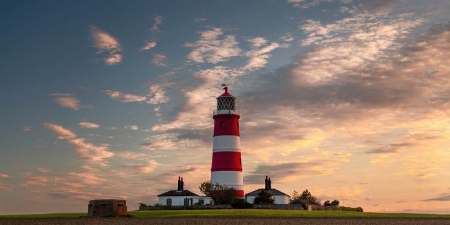 David Powley | Evening light over Happisburgh Lighthouse Norfolk