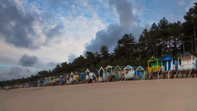 David Powley | Colourful Beach Huts at Wells North Norfolk 