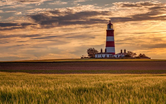David Powley | Evening light over Happisburgh Lighthouse