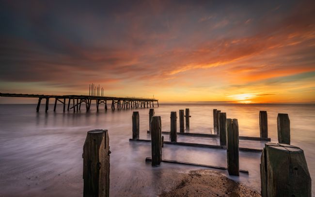 David Powley | Winter Sunrise Over Claremont Pier on Lowestoft Beach