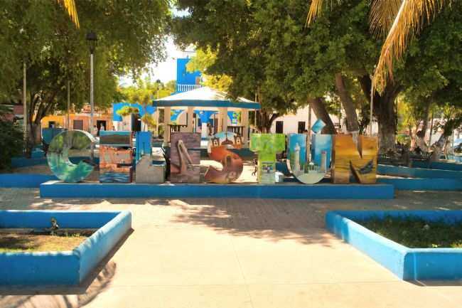 Chris Langley | The Celestun Sign, Celestun main plaza, Yucatan, Mexico