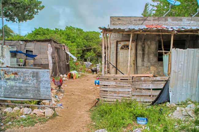Chris Langley | Streetfront of a barrio, Celestun, Yucatan