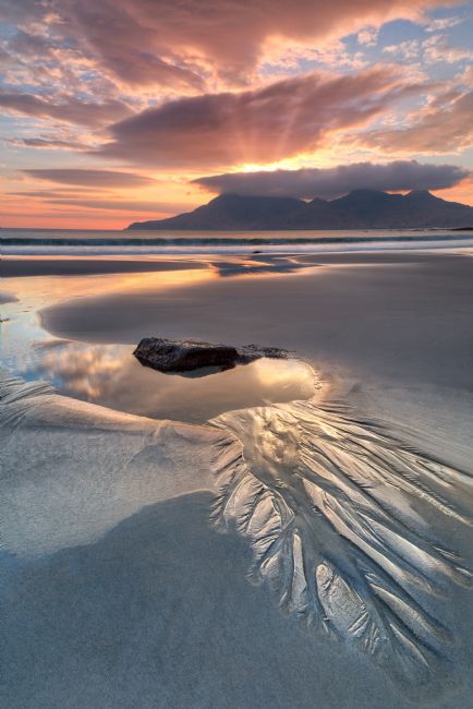 Barbara Jones | Isle of Eigg Singing Sands Sunset over Rum Scotland.